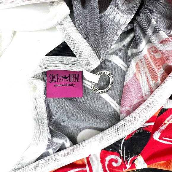 Save the Queen Ladies top. Medium Elbow length sleeves. Metal medallion accent. - Picture 9 of 13